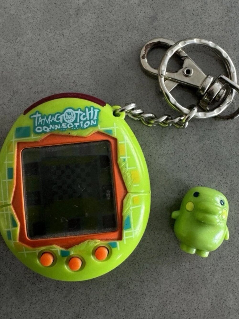 Tamagotchi Connection V1 2004 Green & Orange Plaid Matrix Checkered + Figure